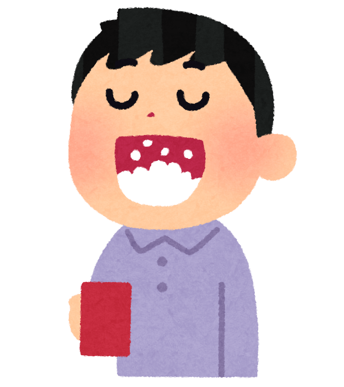 うがいをする男性